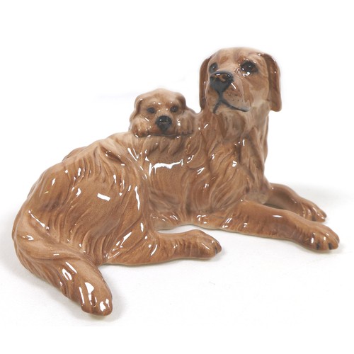 74 - A Beswick Royal Doulton 'Springer Spaniel', model 3135, RD and '107' stamped to the feet, dark brown... 