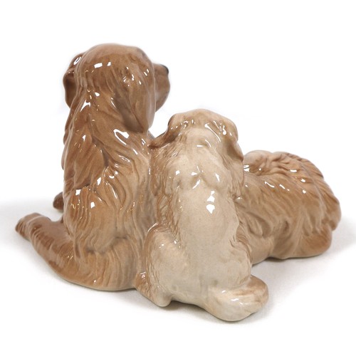 74 - A Beswick Royal Doulton 'Springer Spaniel', model 3135, RD and '107' stamped to the feet, dark brown... 