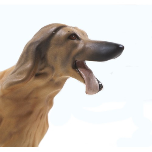 77 - A Beswick 'Afghan Hound - Running' figurine, model 3070, light brown and cream - matt, 14cm high.