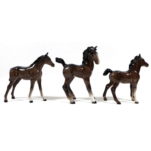 81 - A group of seven Beswick foals and young horses, including 'Foal (Small, stretched, facing left)', m... 