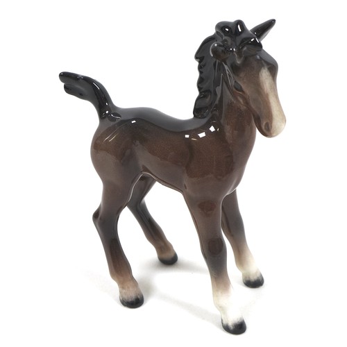 81 - A group of seven Beswick foals and young horses, including 'Foal (Small, stretched, facing left)', m... 