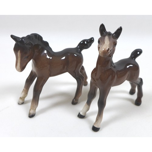 81 - A group of seven Beswick foals and young horses, including 'Foal (Small, stretched, facing left)', m... 