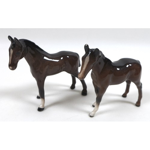 81 - A group of seven Beswick foals and young horses, including 'Foal (Small, stretched, facing left)', m... 