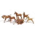 A group of six Beswick foals, including 'Foal (Lying)', model 915, palomino - gloss, 8.3cm high, 'Fo... 