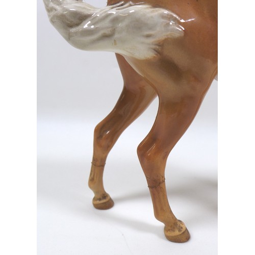 87 - A group of damaged Beswick horses, comprising 'Swish Tail Horse', First Version, model 1182, palomin... 