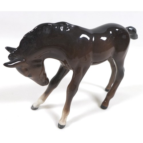 88 - A group of four Beswick foal figurines, including 'Shire Foal (Small)', model 1053, brown - gloss, 1... 