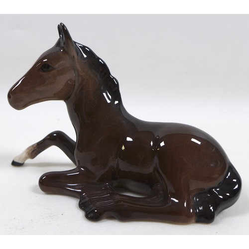 88 - A group of four Beswick foal figurines, including 'Shire Foal (Small)', model 1053, brown - gloss, 1... 