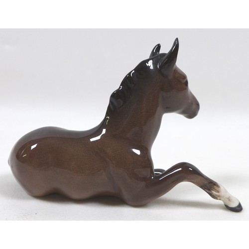 88 - A group of four Beswick foal figurines, including 'Shire Foal (Small)', model 1053, brown - gloss, 1... 