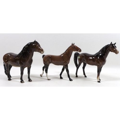 89 - A group of three Beswick horses, including 'Exmoor Pony 