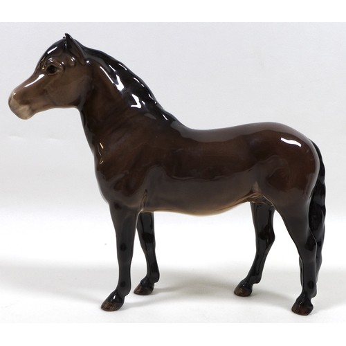 89 - A group of three Beswick horses, including 'Exmoor Pony 