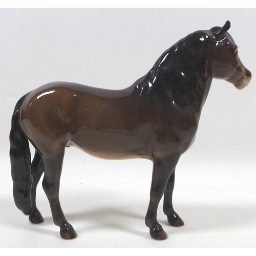 89 - A group of three Beswick horses, including 'Exmoor Pony 