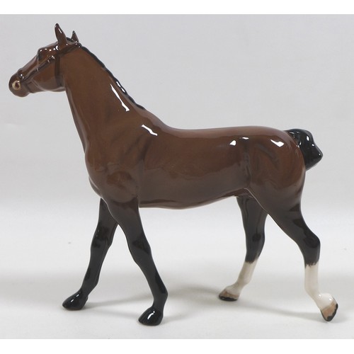 89 - A group of three Beswick horses, including 'Exmoor Pony 