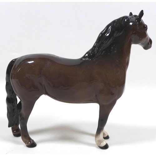 90 - A group of three Beswick horses, including 'Mare (Facing right, head down)', model 1812, brown - glo... 