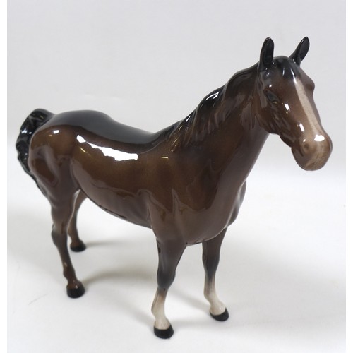 91 - Two Beswick horses, including 'Swish Tail Horse', Second Version, model 1182, brown - gloss, 22.2cm ... 