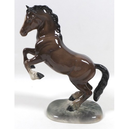 93 - A Beswick 'Welsh Cob (Rearing)' figurine, Second Version, model 1014, brown - gloss, 26cm high.