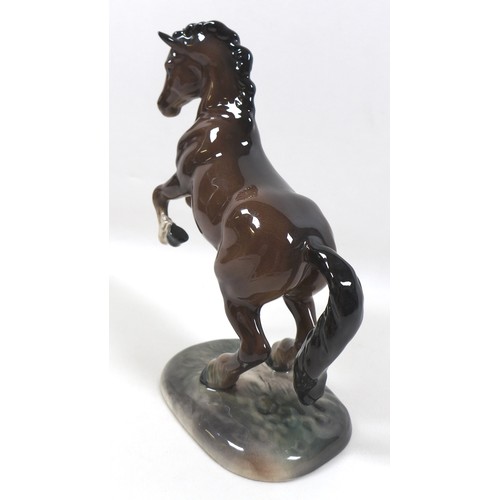 93 - A Beswick 'Welsh Cob (Rearing)' figurine, Second Version, model 1014, brown - gloss, 26cm high.