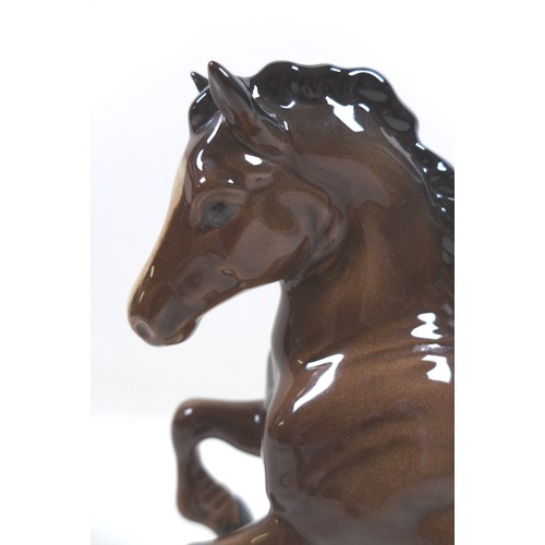 93 - A Beswick 'Welsh Cob (Rearing)' figurine, Second Version, model 1014, brown - gloss, 26cm high.