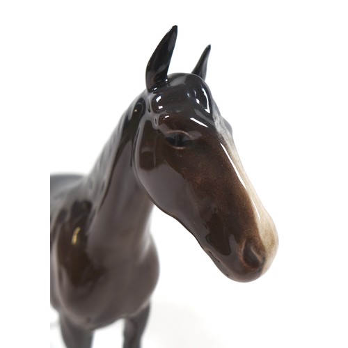 95 - Two Beswick horses, including 'Imperial', model 1557, brown - gloss, 20.5cm high, and  'Thoroughbred... 