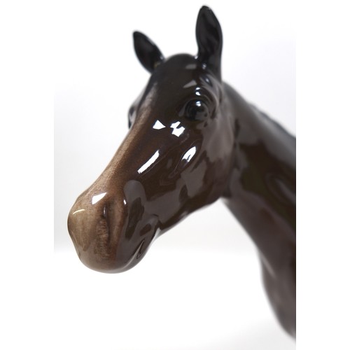 95 - Two Beswick horses, including 'Imperial', model 1557, brown - gloss, 20.5cm high, and  'Thoroughbred... 