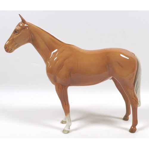 97 - Two palomino Beswick horses, including 'Imperial', model 1557, palomino - gloss, 20.5cm high, and '