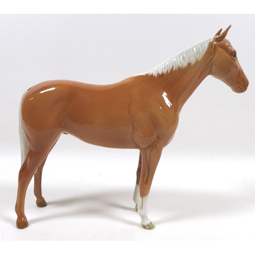 97 - Two palomino Beswick horses, including 'Imperial', model 1557, palomino - gloss, 20.5cm high, and '