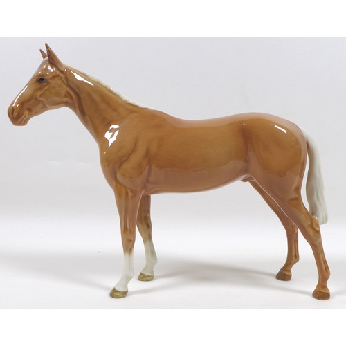 97 - Two palomino Beswick horses, including 'Imperial', model 1557, palomino - gloss, 20.5cm high, and '