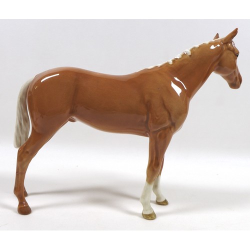 97 - Two palomino Beswick horses, including 'Imperial', model 1557, palomino - gloss, 20.5cm high, and '