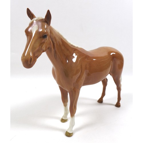 97 - Two palomino Beswick horses, including 'Imperial', model 1557, palomino - gloss, 20.5cm high, and '