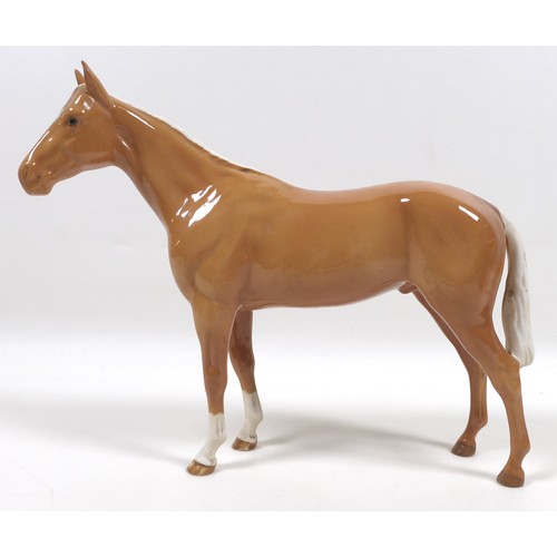 98 - Two palomino Beswick horses, comprising '