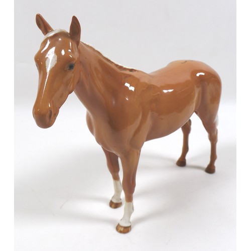 98 - Two palomino Beswick horses, comprising '