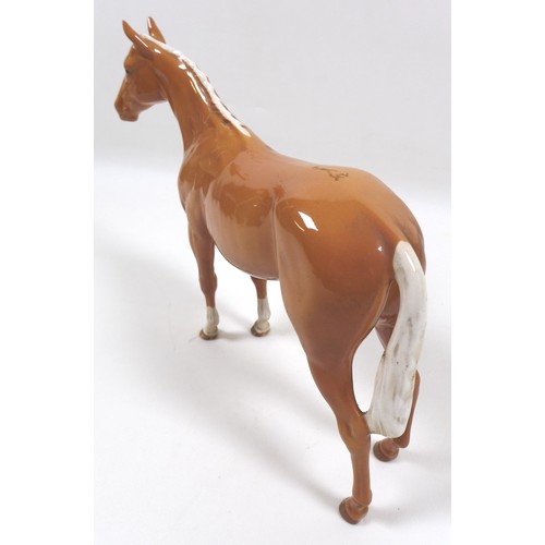 98 - Two palomino Beswick horses, comprising '