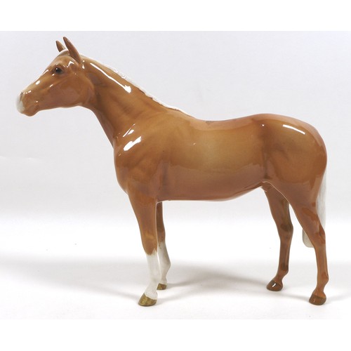 98 - Two palomino Beswick horses, comprising '