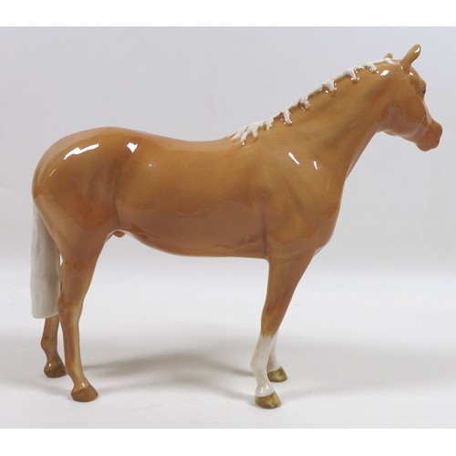 98 - Two palomino Beswick horses, comprising '