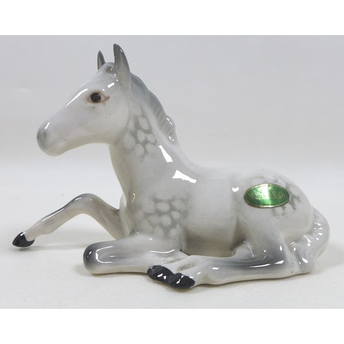 101 - A group of four grey Beswick horses, including 'Foal (Grazing), Second Version, model 946, grey - gl... 