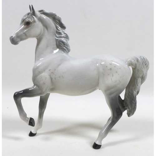 103 - A group of three Beswick horses and ponies, including 'Connemara Pony 