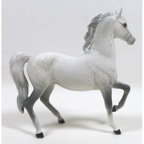 103 - A group of three Beswick horses and ponies, including 'Connemara Pony 