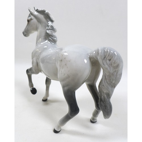 103 - A group of three Beswick horses and ponies, including 'Connemara Pony 