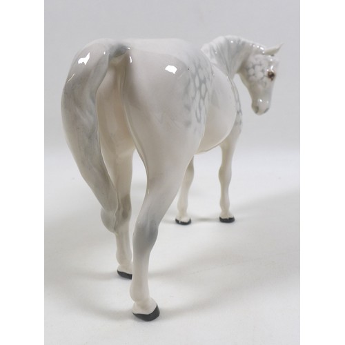 103 - A group of three Beswick horses and ponies, including 'Connemara Pony 