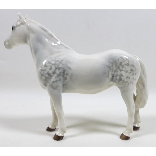 103 - A group of three Beswick horses and ponies, including 'Connemara Pony 