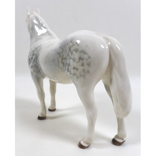 103 - A group of three Beswick horses and ponies, including 'Connemara Pony 