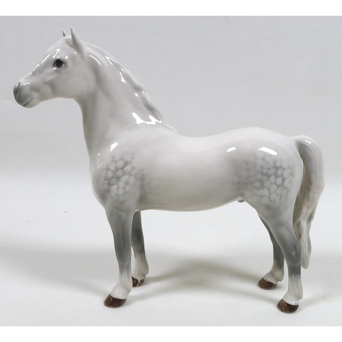 104 - A group of three Beswick horses, including 'Mare (Facing right, head down), model 1812. grey - gloss... 