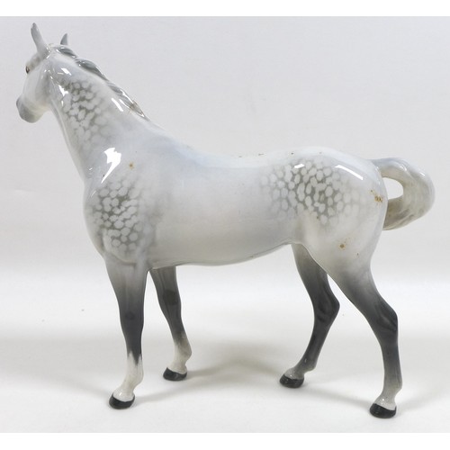 105 - Two large Beswick horses, comprising 'Swish Tail Horse', model 1182, grey - gloss, 22.2cm high, and ... 