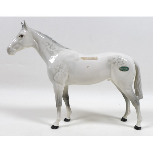 105 - Two large Beswick horses, comprising 'Swish Tail Horse', model 1182, grey - gloss, 22.2cm high, and ... 