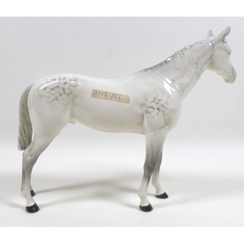 105 - Two large Beswick horses, comprising 'Swish Tail Horse', model 1182, grey - gloss, 22.2cm high, and ... 