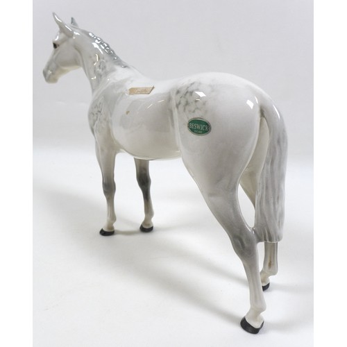 105 - Two large Beswick horses, comprising 'Swish Tail Horse', model 1182, grey - gloss, 22.2cm high, and ... 