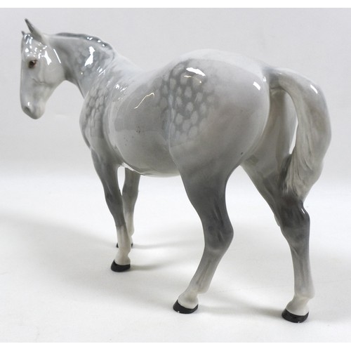 107 - A Beswick figurine modelled as 'Mare (facing left)', model 976, grey - gloss, 17.2cm high, together ... 