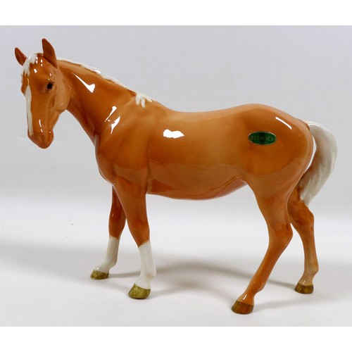 112 - Two Beswick palomino horse figurines, including 'Mare (facing left)', model 976, palomino - gloss, 1... 