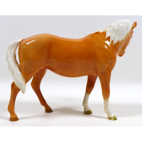 112 - Two Beswick palomino horse figurines, including 'Mare (facing left)', model 976, palomino - gloss, 1... 