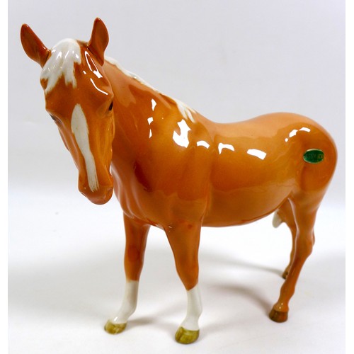 112 - Two Beswick palomino horse figurines, including 'Mare (facing left)', model 976, palomino - gloss, 1... 