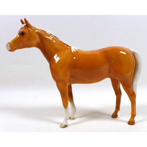 112 - Two Beswick palomino horse figurines, including 'Mare (facing left)', model 976, palomino - gloss, 1... 